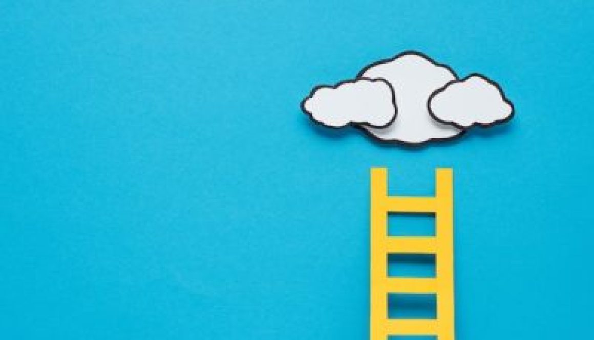 paper ladder with clouds and copy space on background, setting goals concept